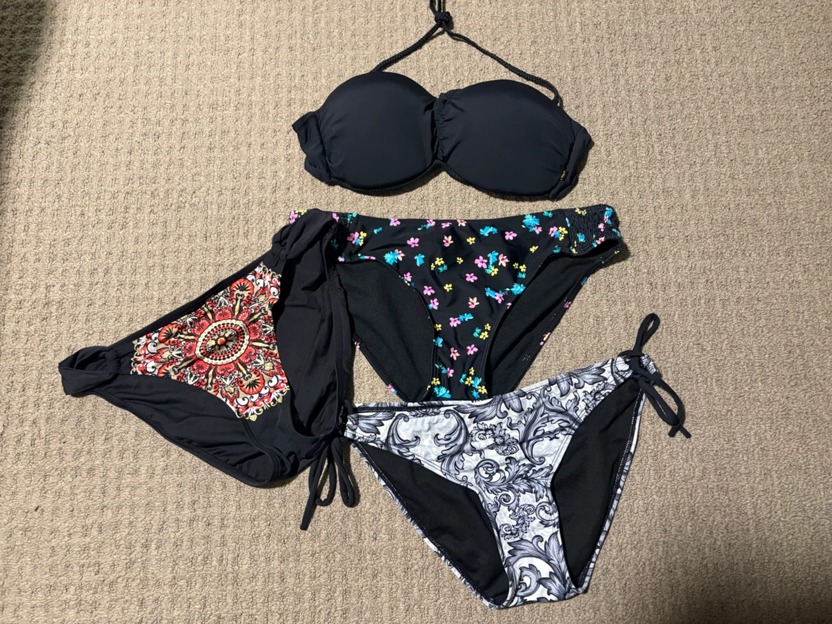 Black bikini top and three pairs of bikini bottoms