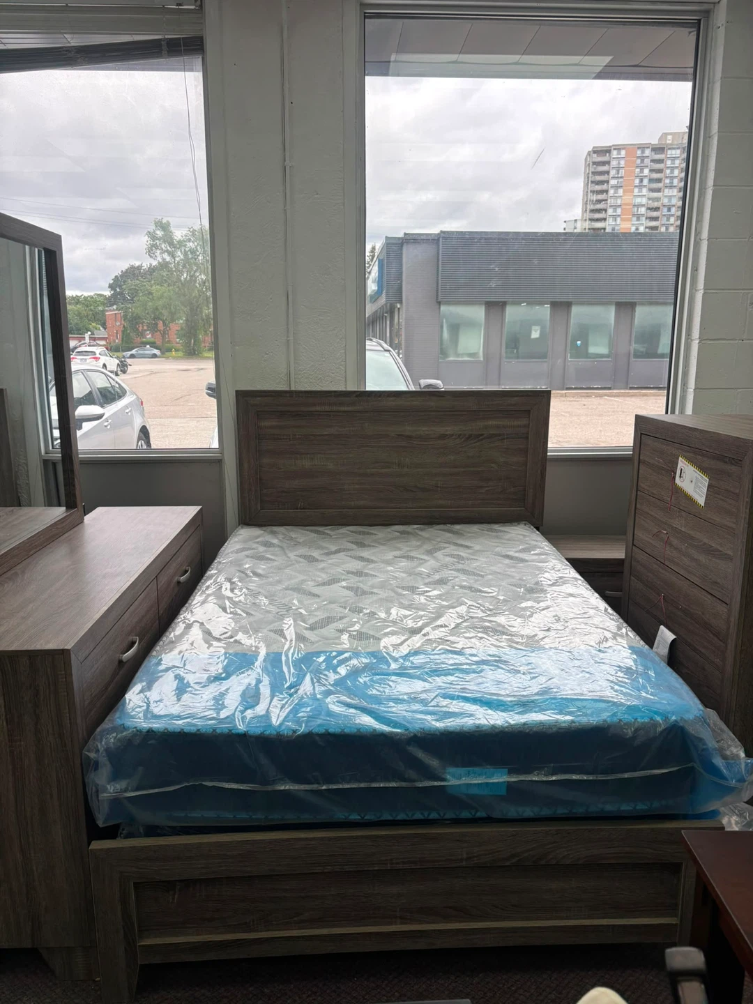 Wooden bed frame with mattress
