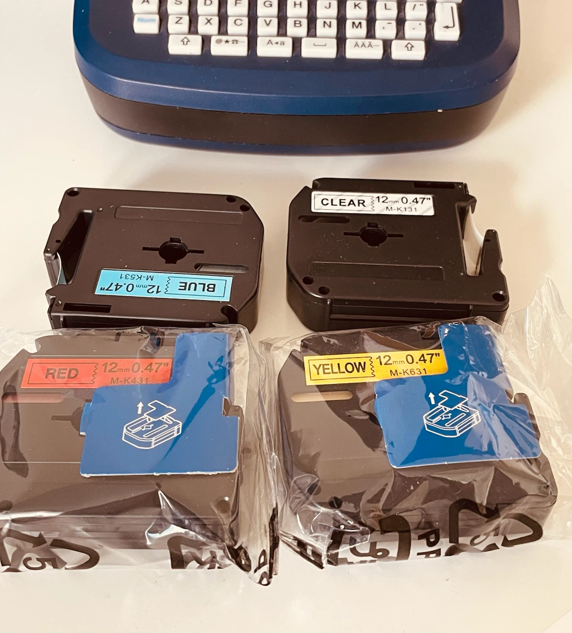 Brother P-touch PT-65 Label Maker with 4 Tape Refills - photo 2