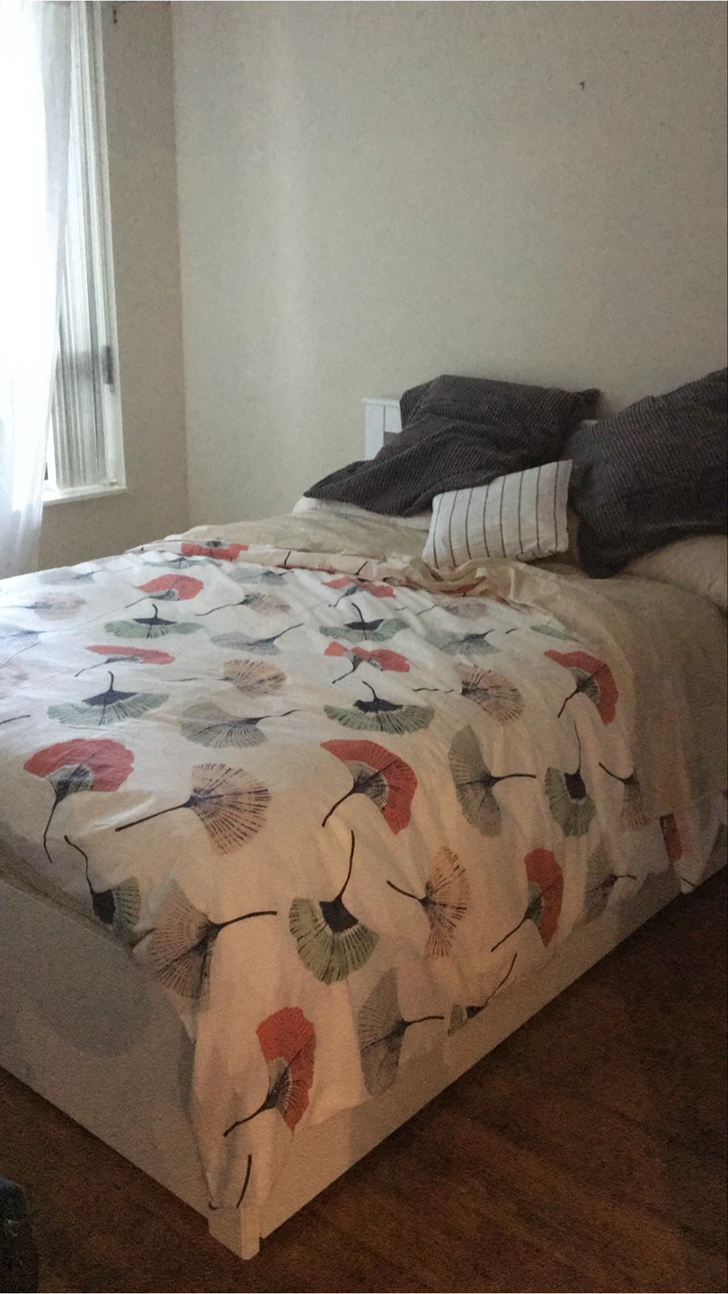 White bed with mattress