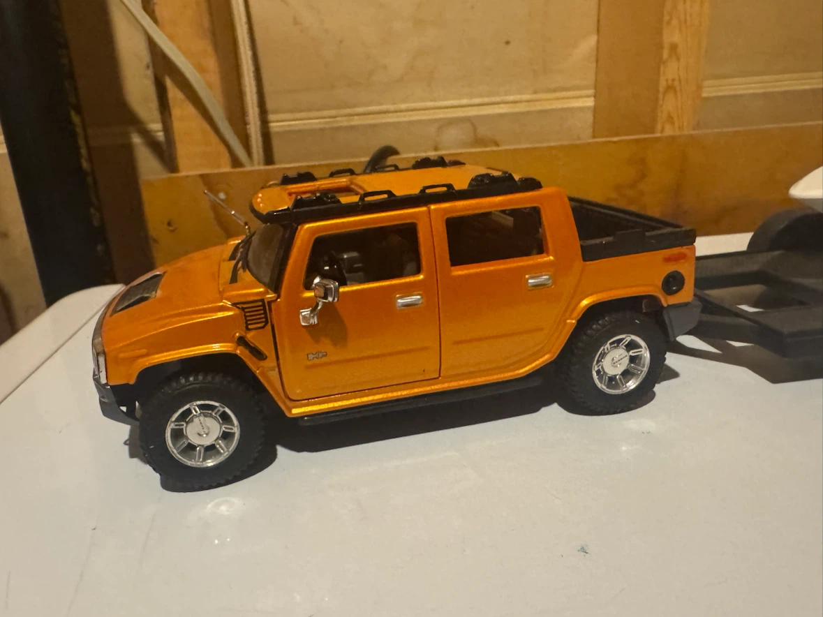 Diecast Hummer with Boat and Trailer. - photo 2