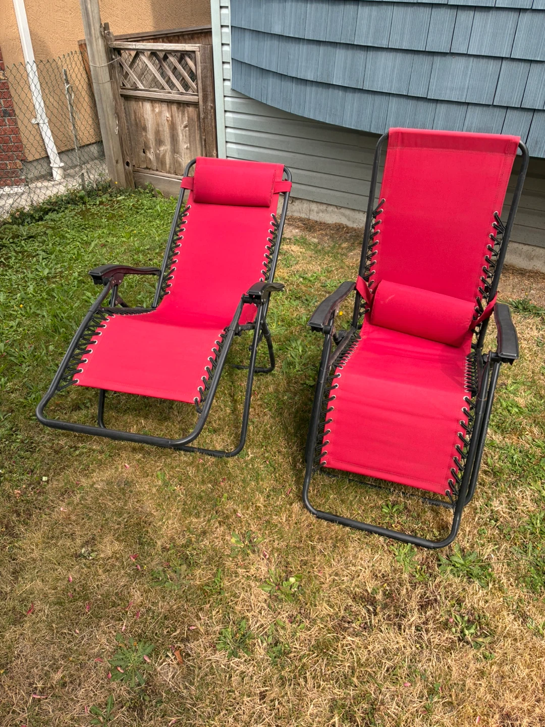 2 Red Zero Gravity Chairs