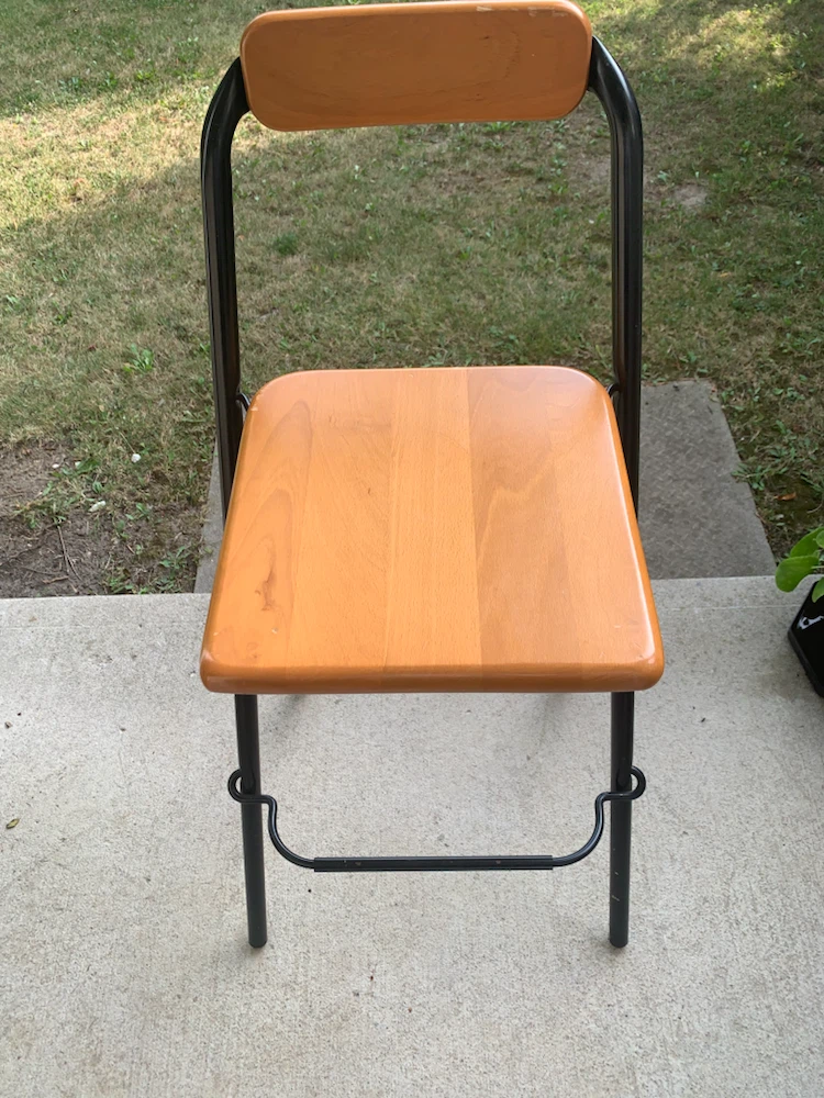 Black and light wood metal folding chair