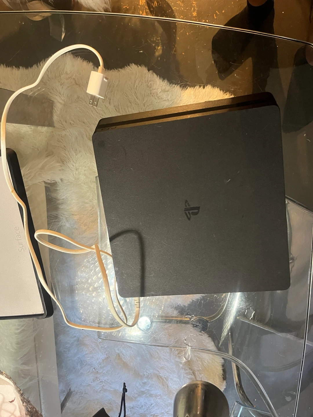 Black PlayStation 4 Slim console working fine