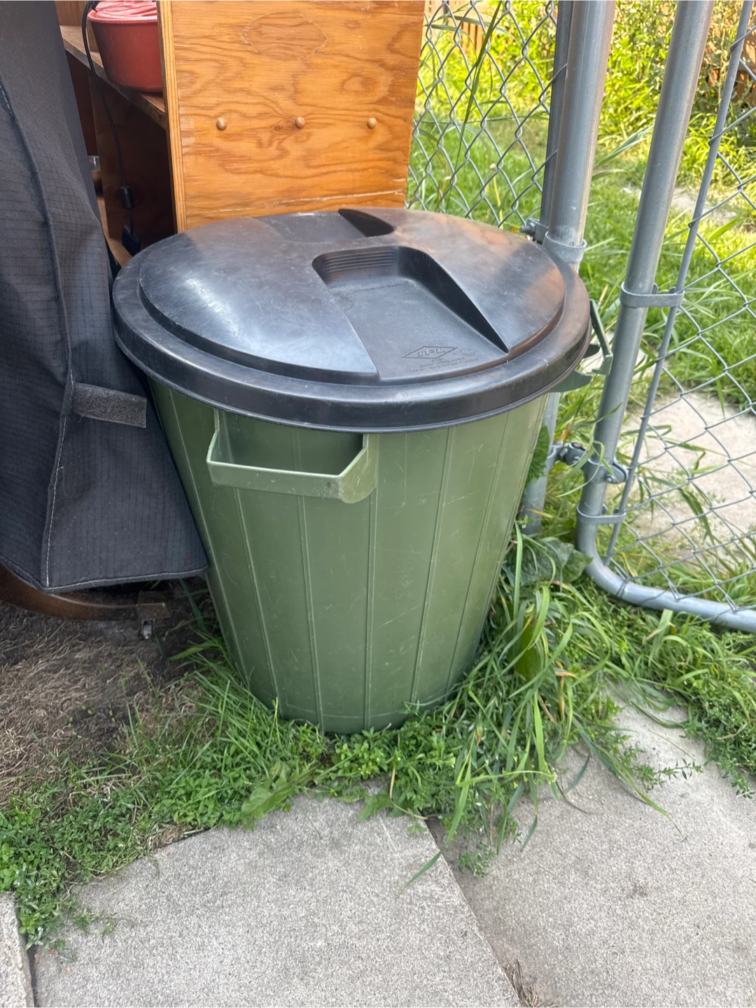 Green Garbage Can with Lid