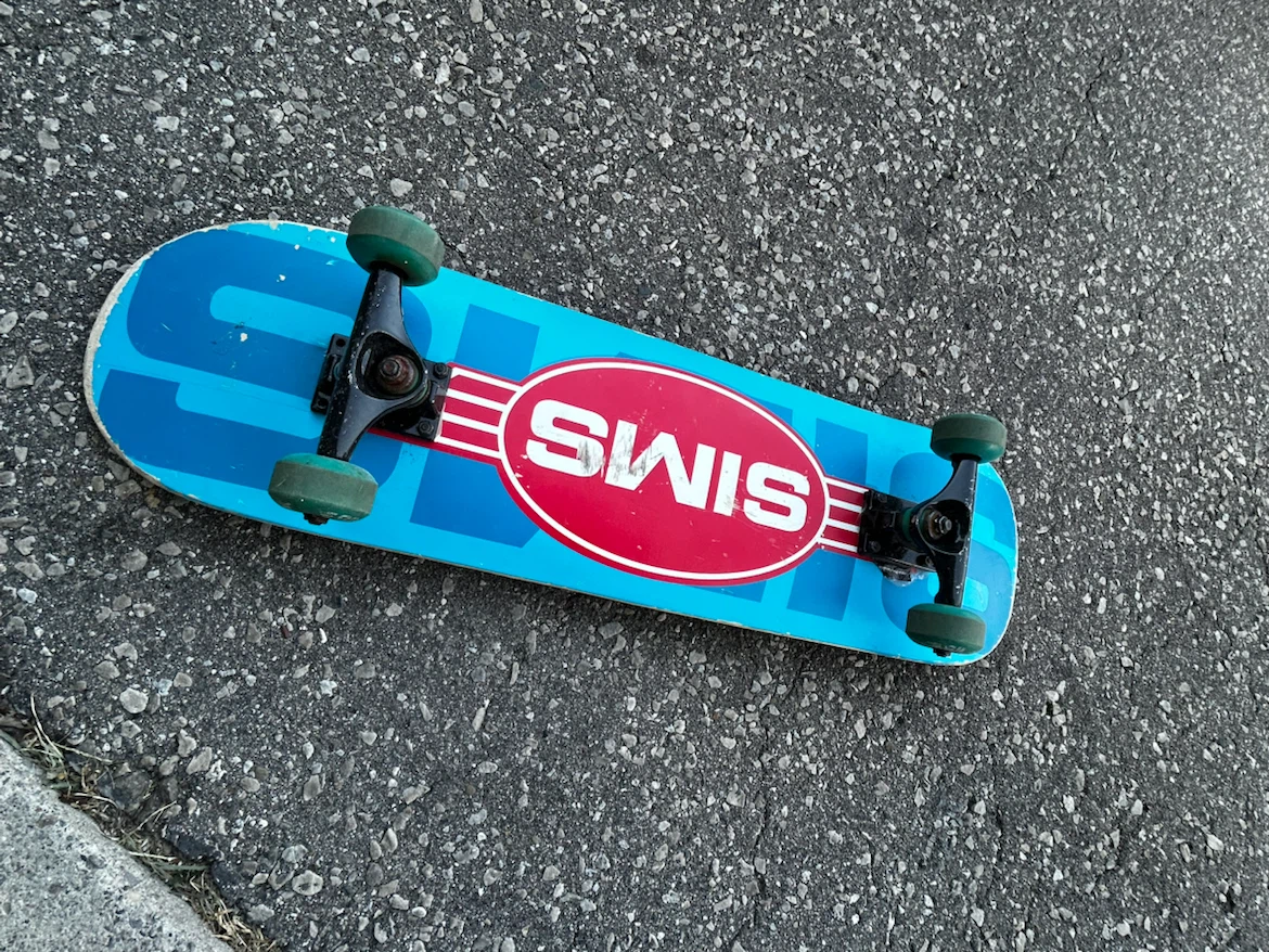 Blue and Red Sims Skateboard
