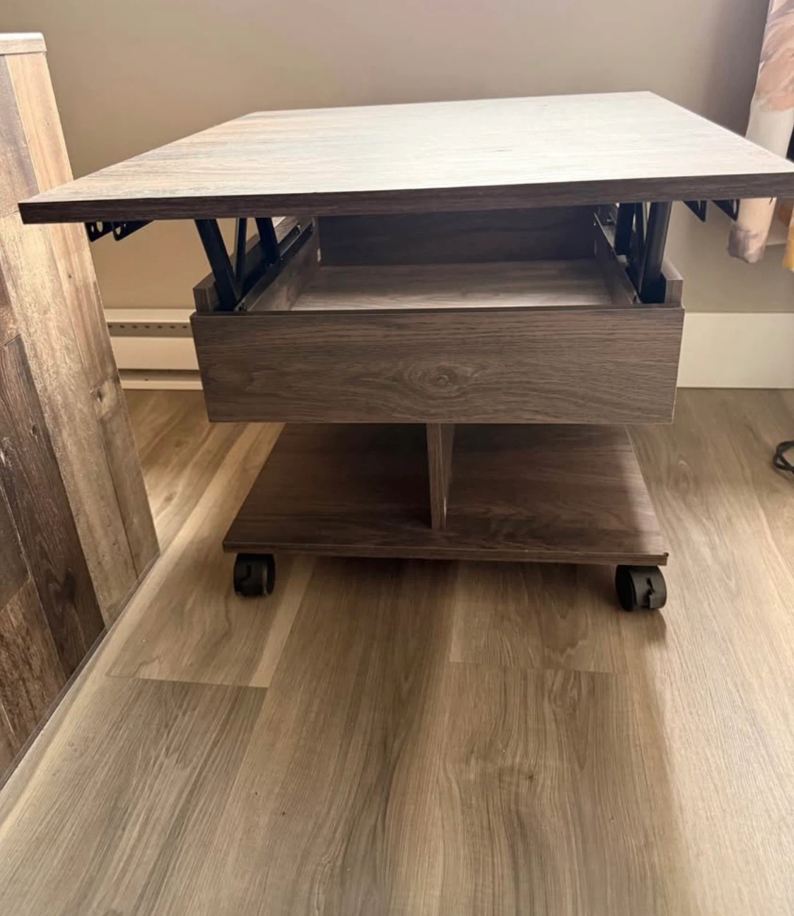 Lift- top table with storage and wheels