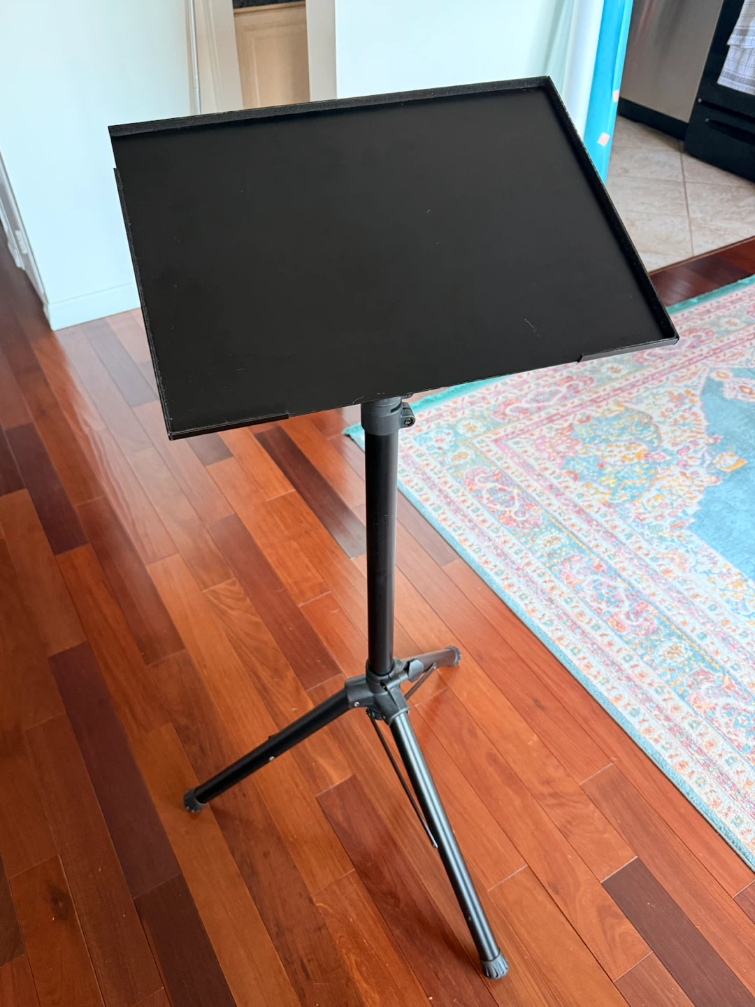 Black adjustable tripod projector stand