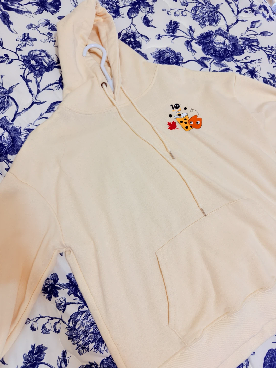 Cream coloured hoodie with cute bubble tea graphic