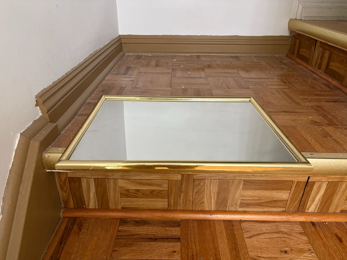 Mirror with golden frame