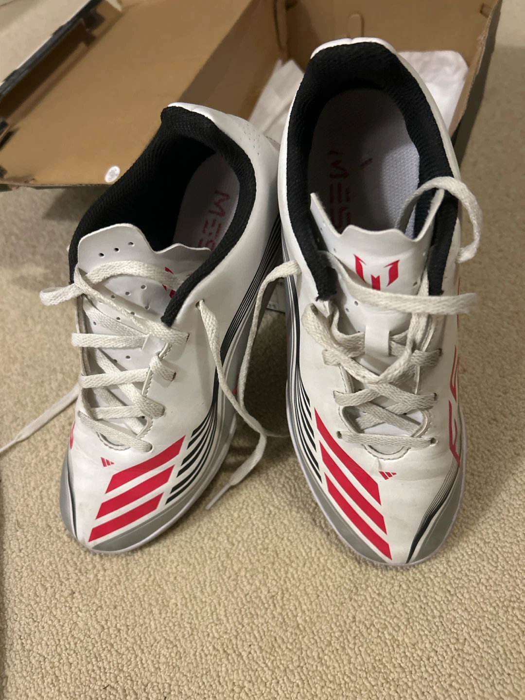Youth size 5.5 Messi club indoor soccer shoes.
