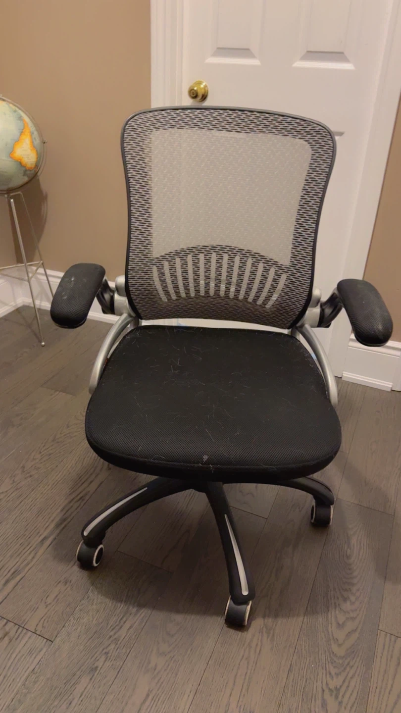 Mesh back office chair with adjustable arms