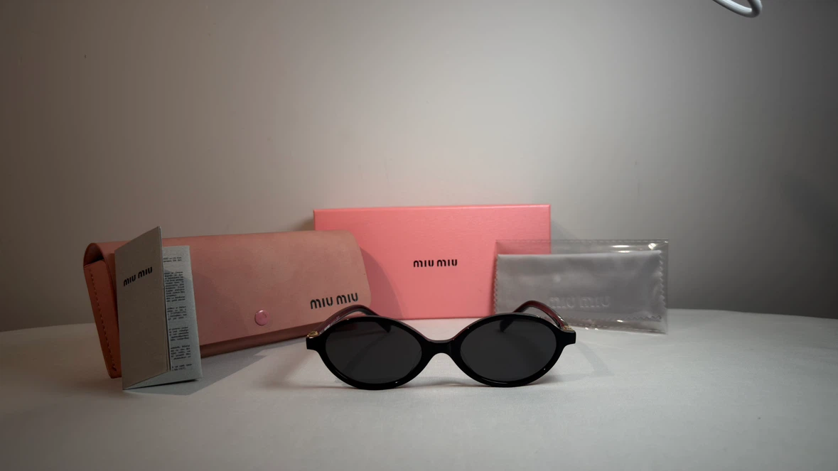 Miu Miu Oval Sunglasses - photo 2