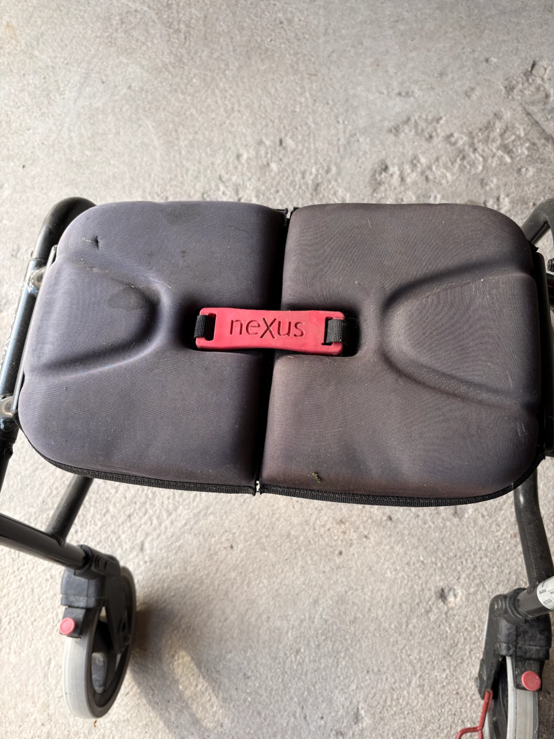 Human Care neXus folding walker with seat