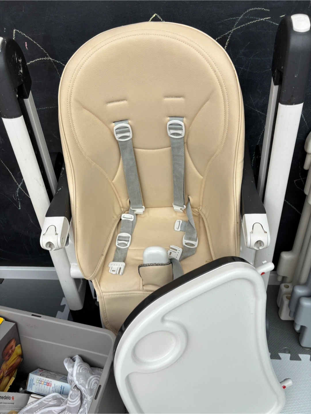 Cream beige high chair with tray