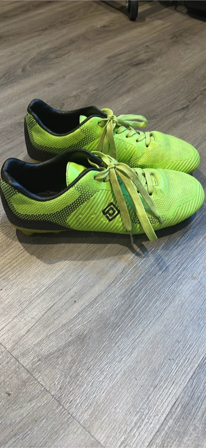 Neon green soccer cleats