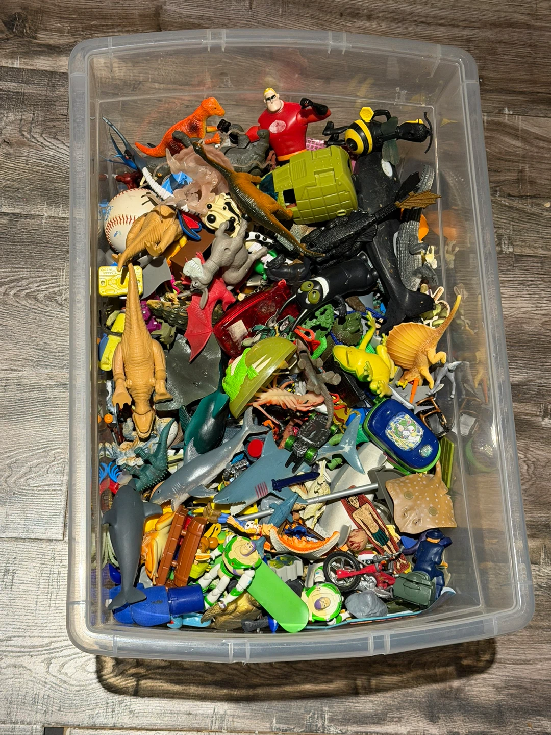 Large Bin of Assorted Action Figures and Toys