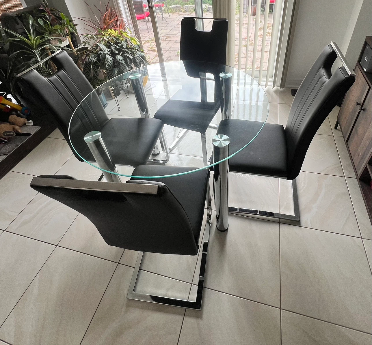 Glass Dining Table with 4 Black Faux Leather Chairs