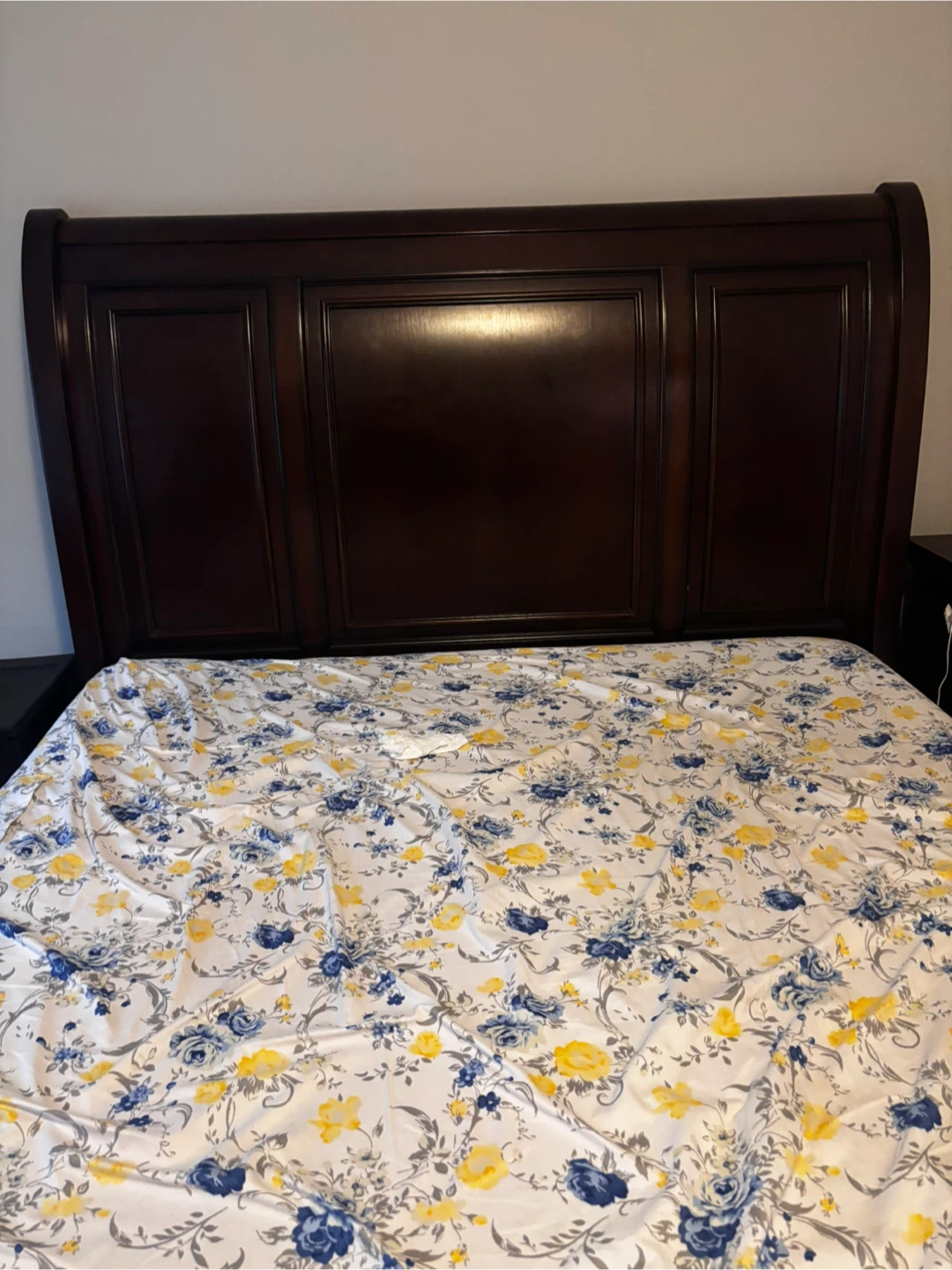 Dark wood storage bed frame with matching nightstand