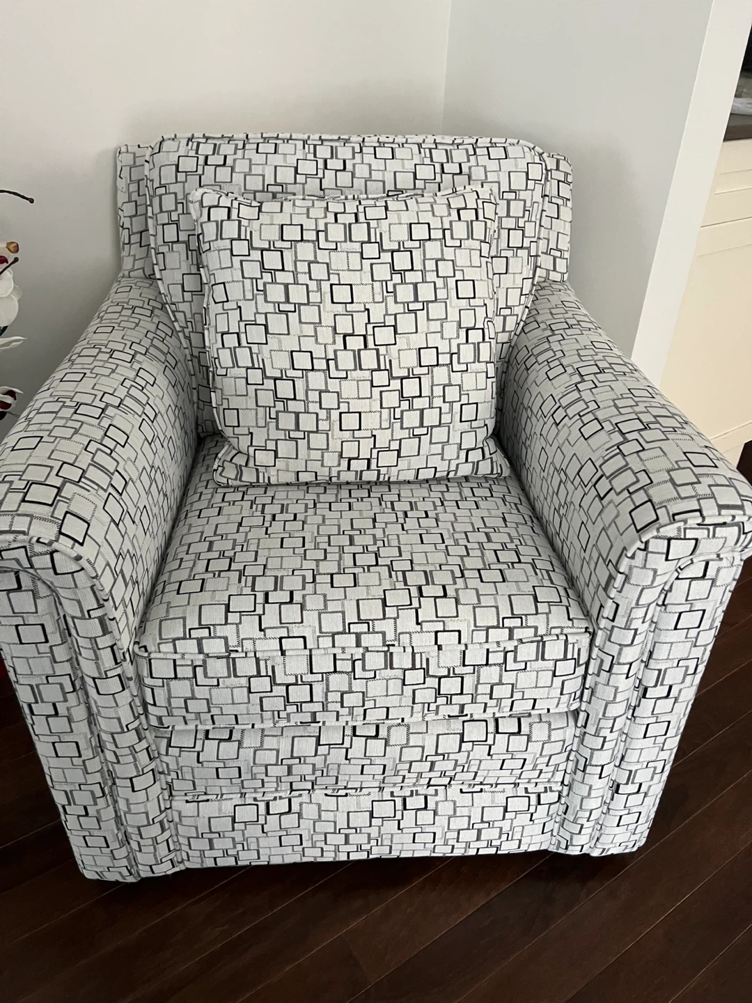 Geometric Pattern Armchair Swivels with Matching Pillow