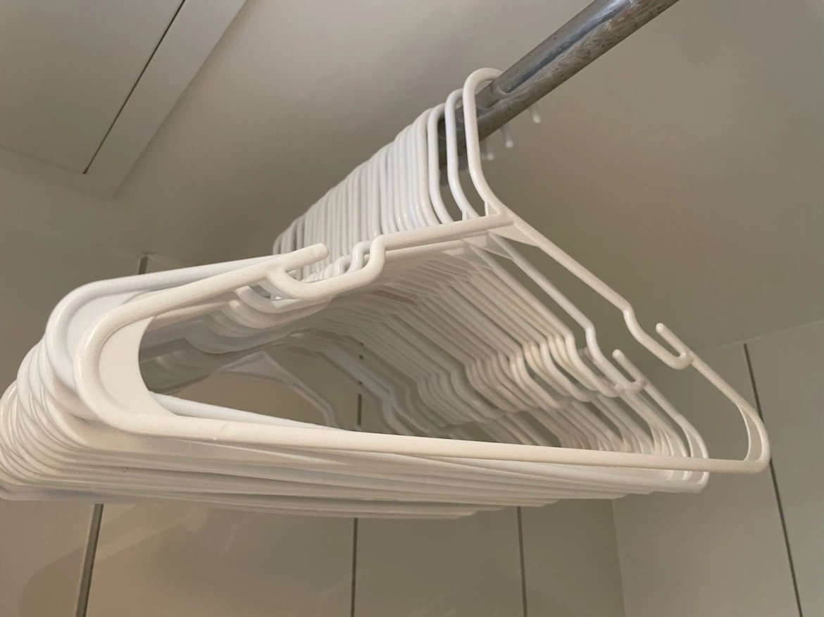 Set of White Plastic Hangers