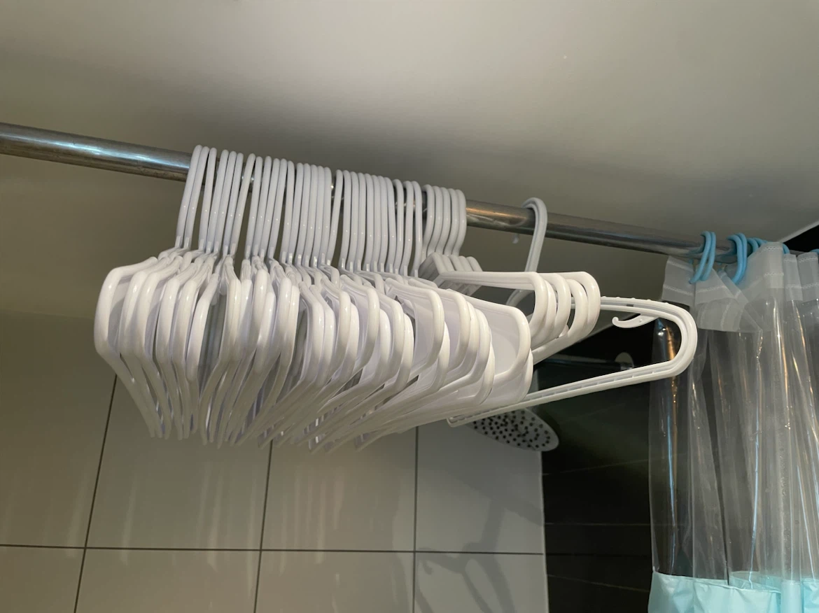 White Plastic Hangers - Set of 28 - photo 2