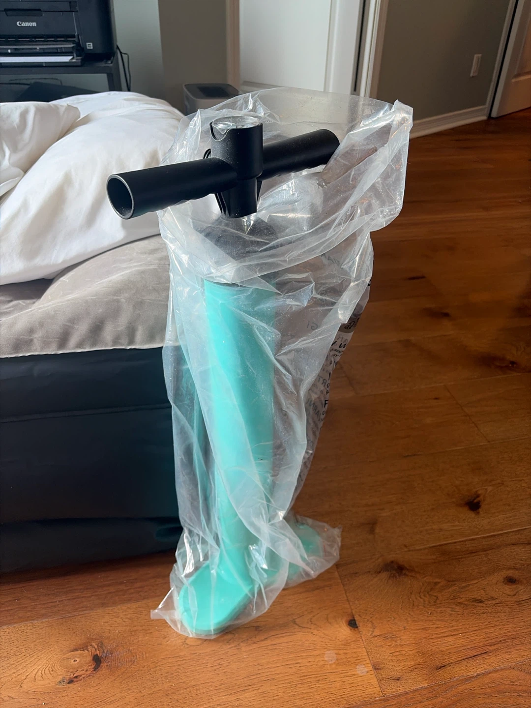 Teal and Black Hand Pump