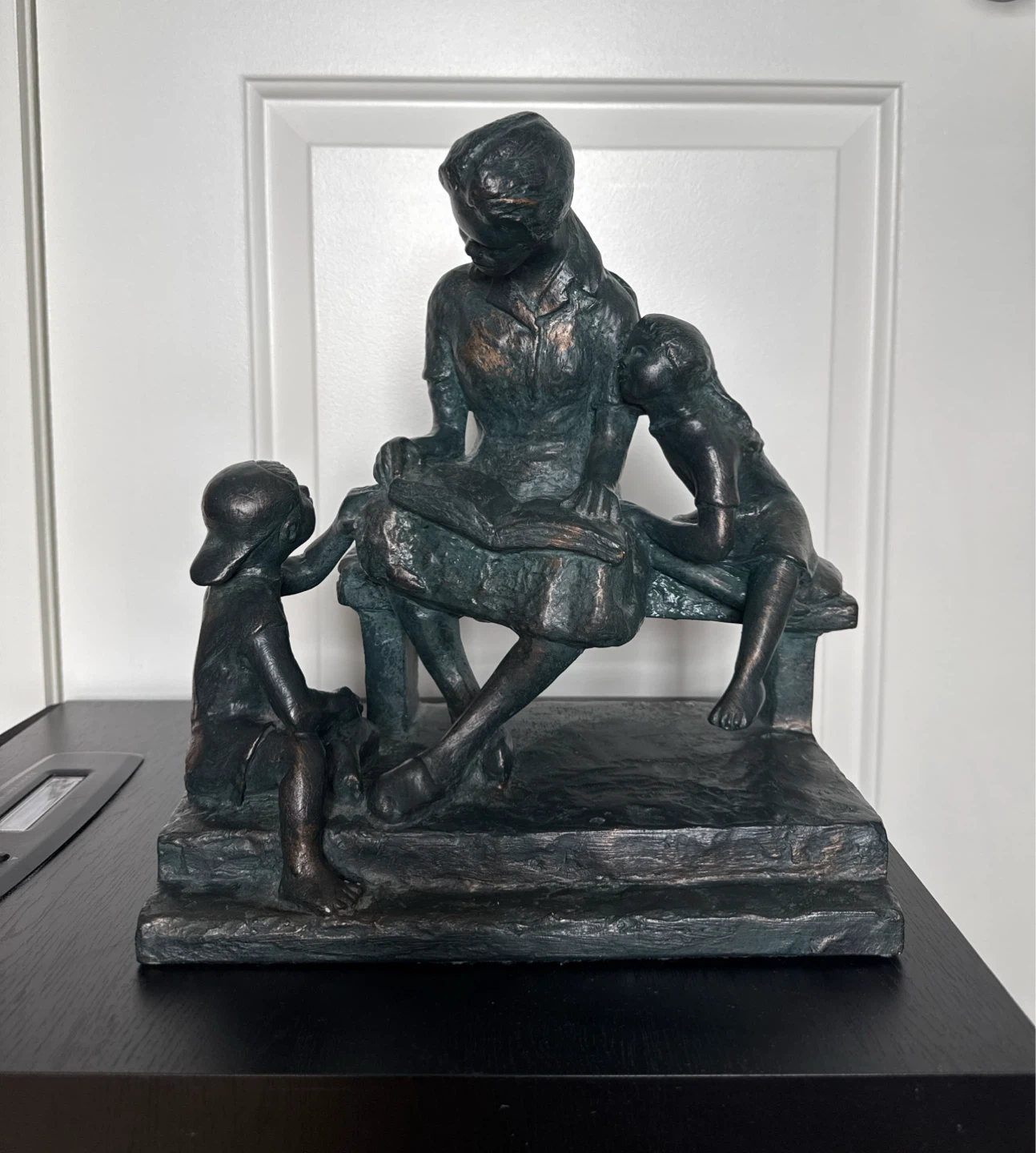 “Story Time” Sculpture of mother reading to children