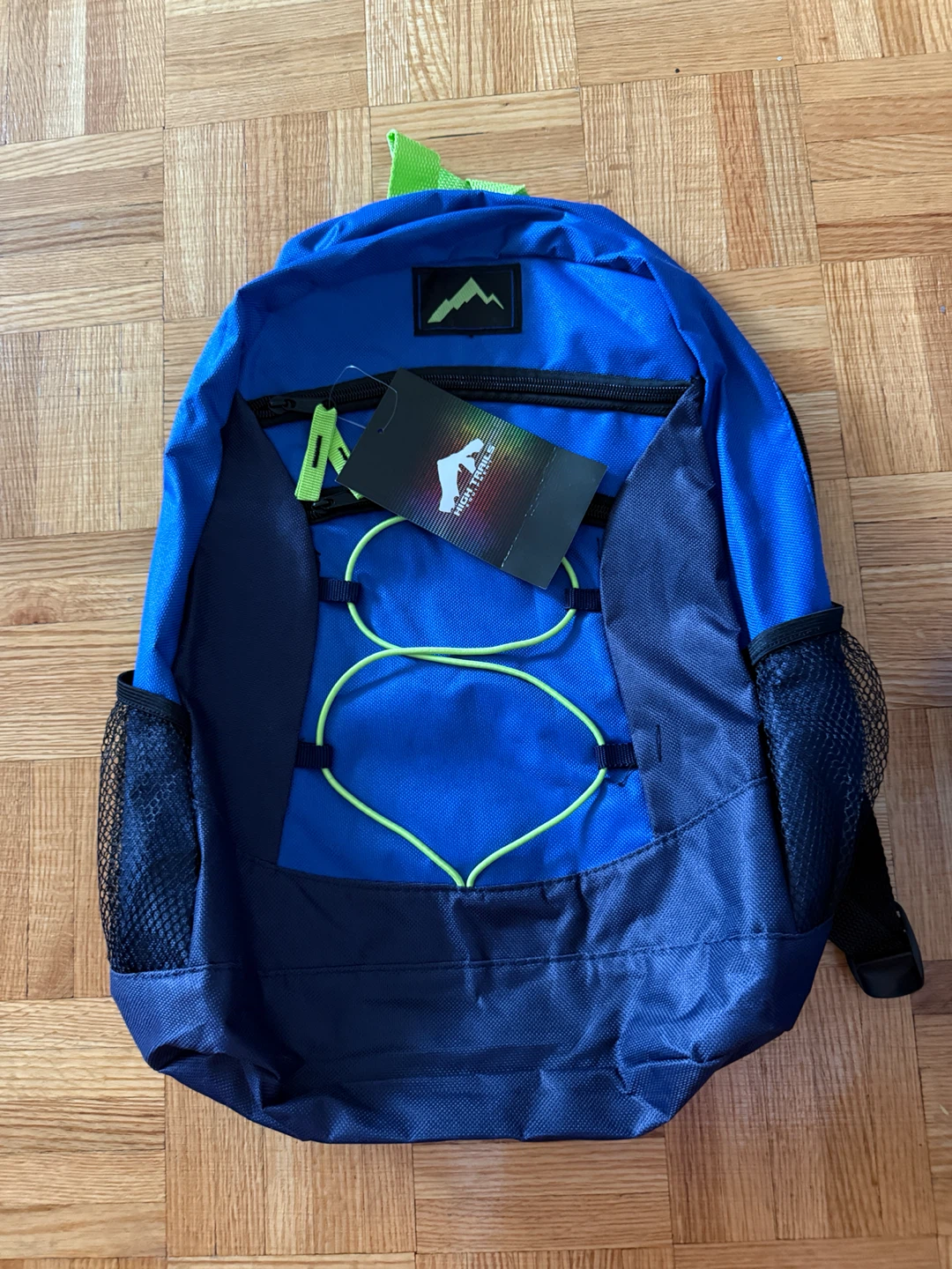 Blue Backpack with Green Accents