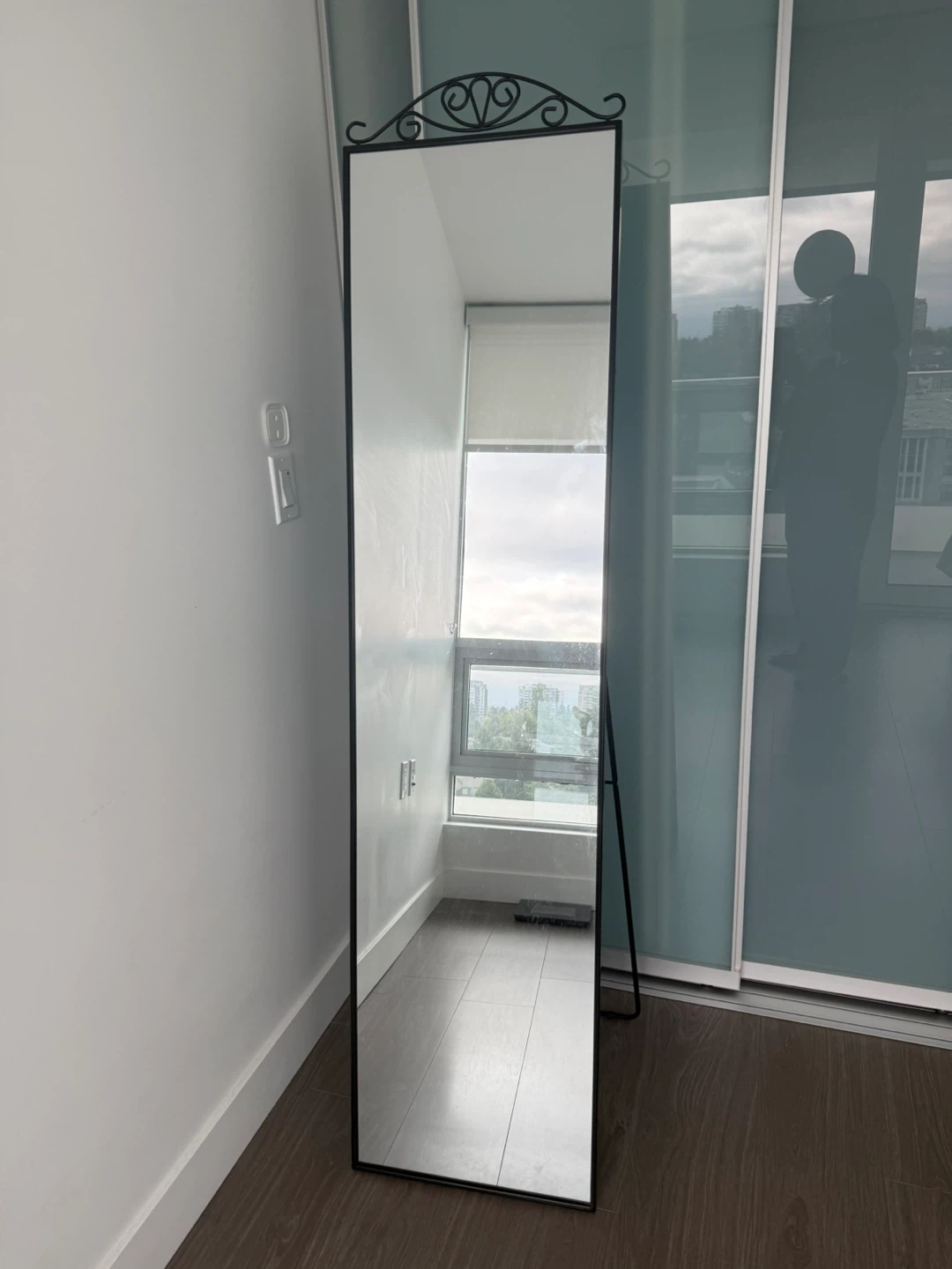An almost new IKEA standing mirror for sale