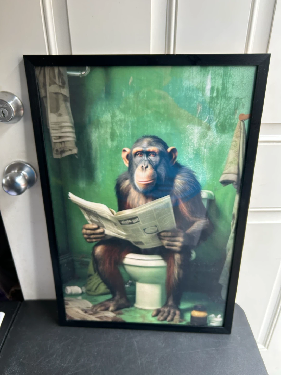 Framed Art Print: Chimpanzee Reading Newspaper