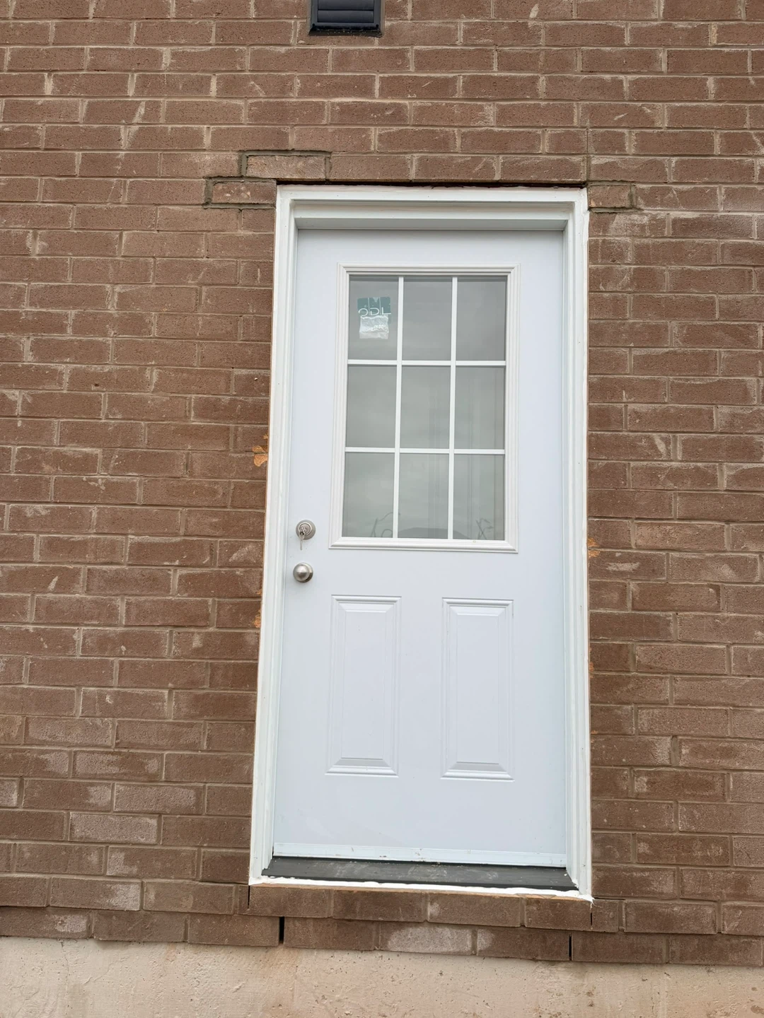 White Exterior Door with Window