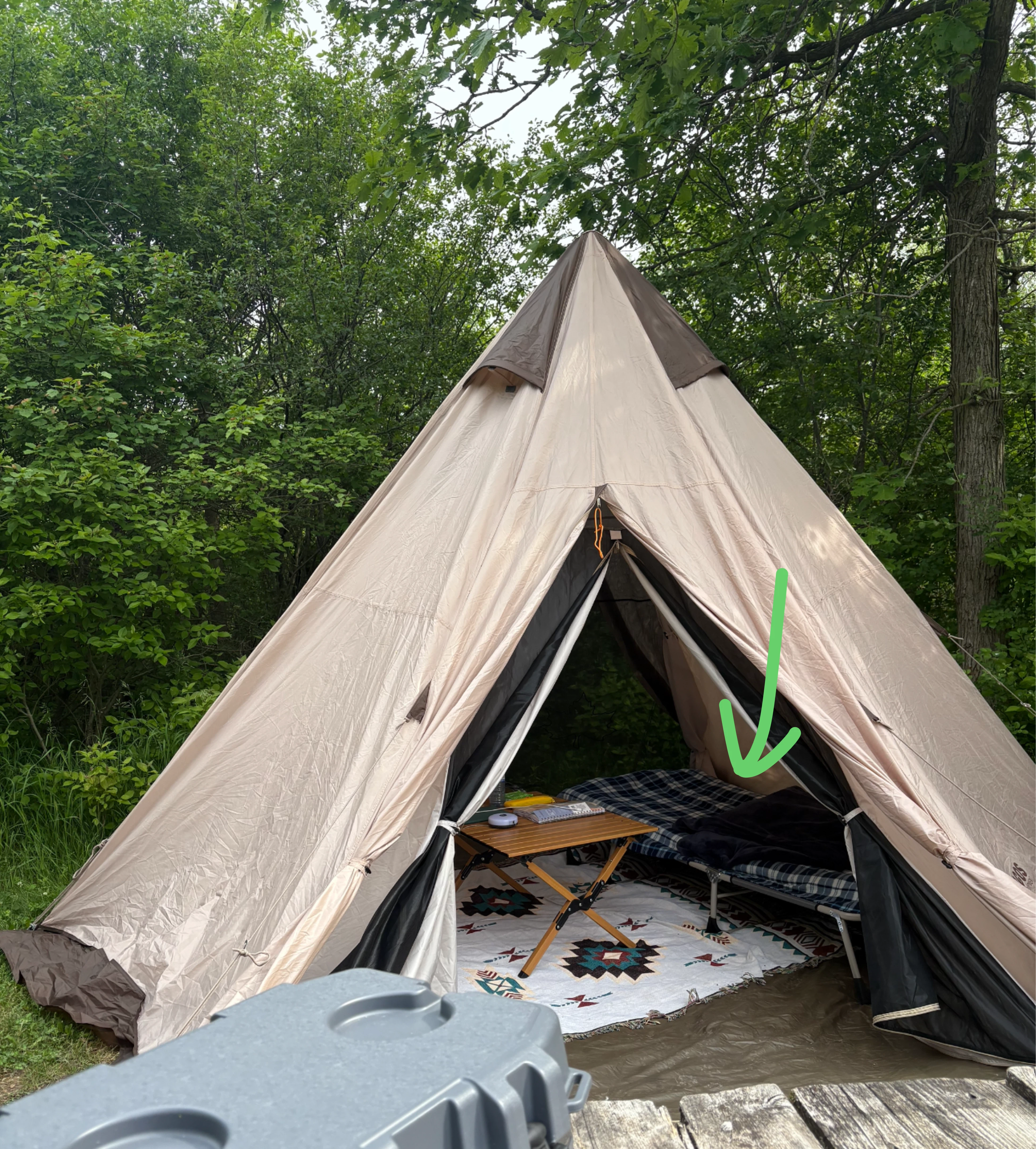 folding camping cot in grey