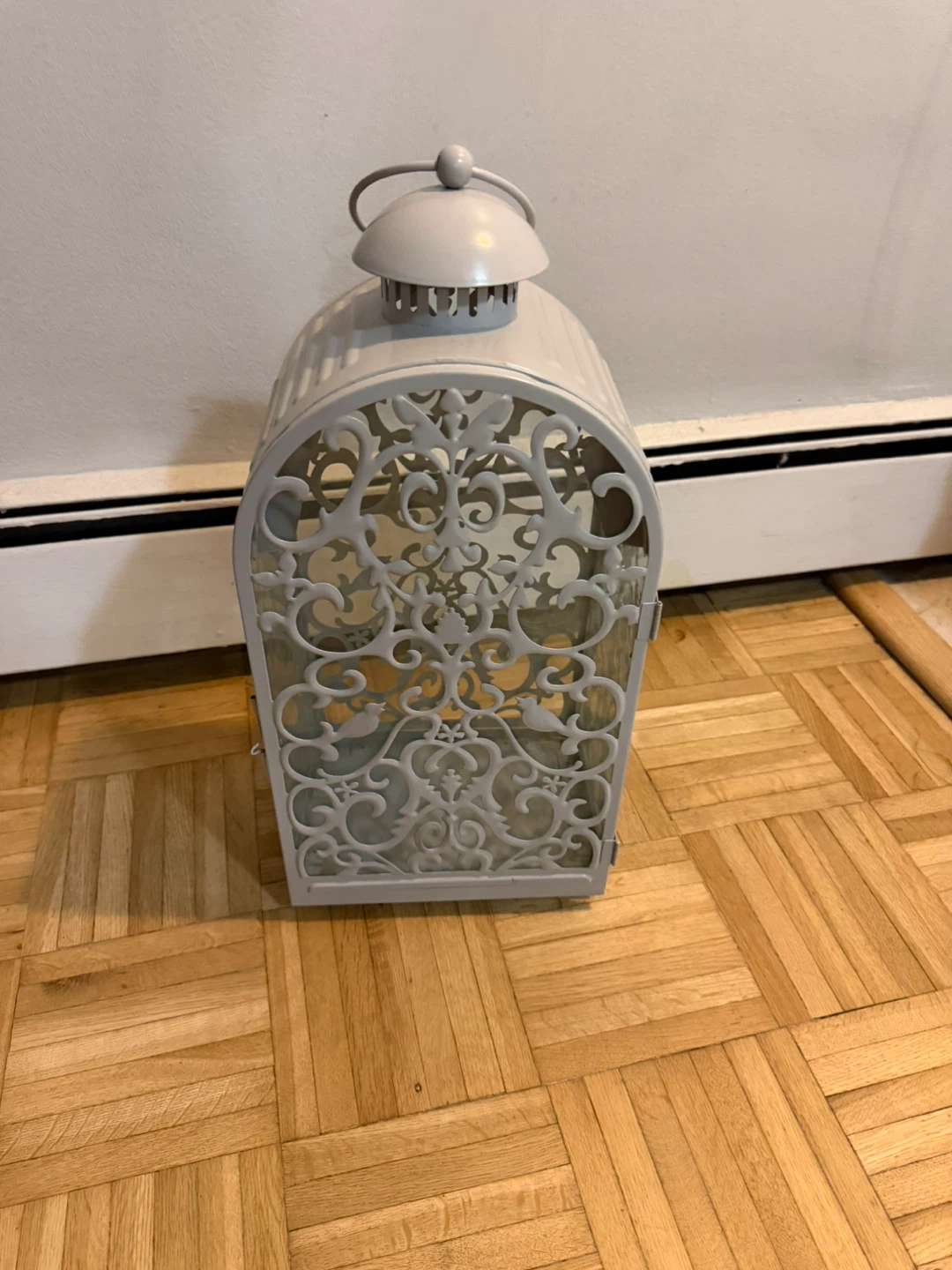 Gray Metal Lantern with Filigree Design