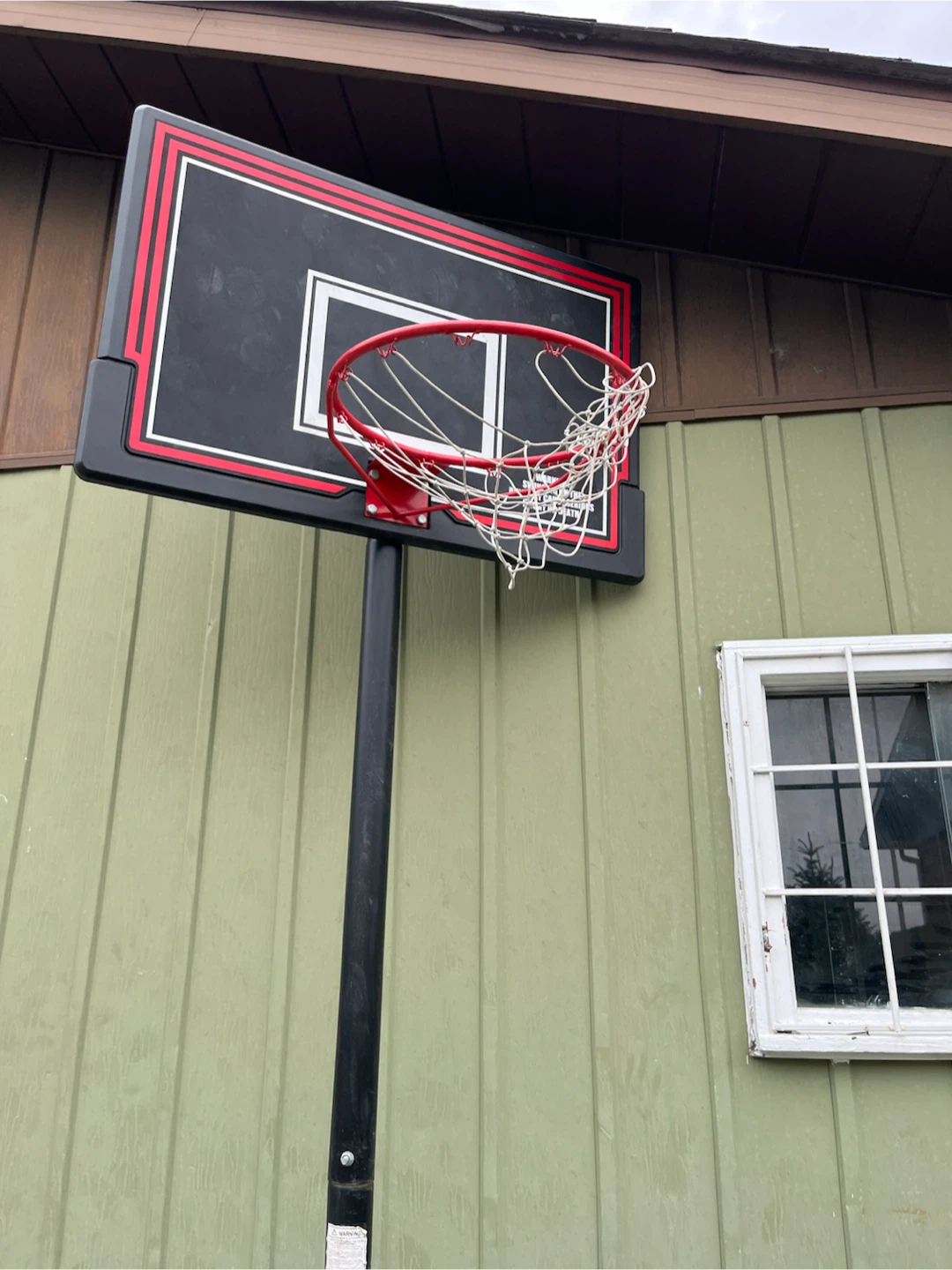 Kids bike and basketball hoop
