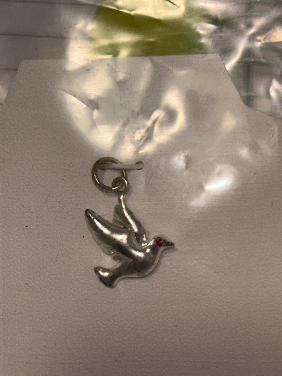 Silver Dove Charm with Red Eye