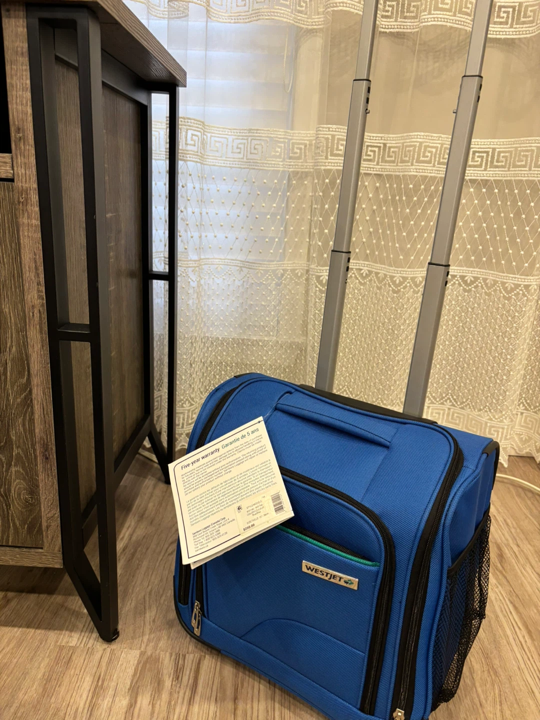 WestJet Apollo 3 Blue Rolling Luggage 20" Carry-on