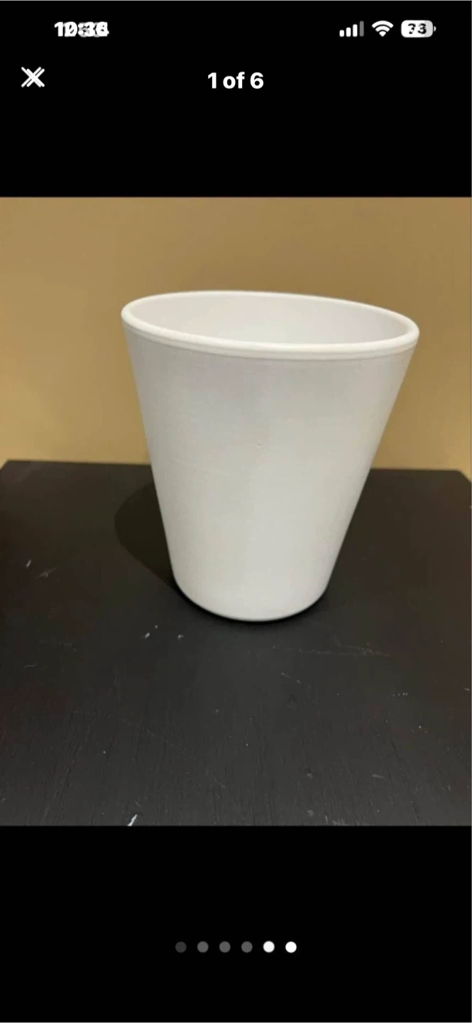 Small white ceramic plant pot