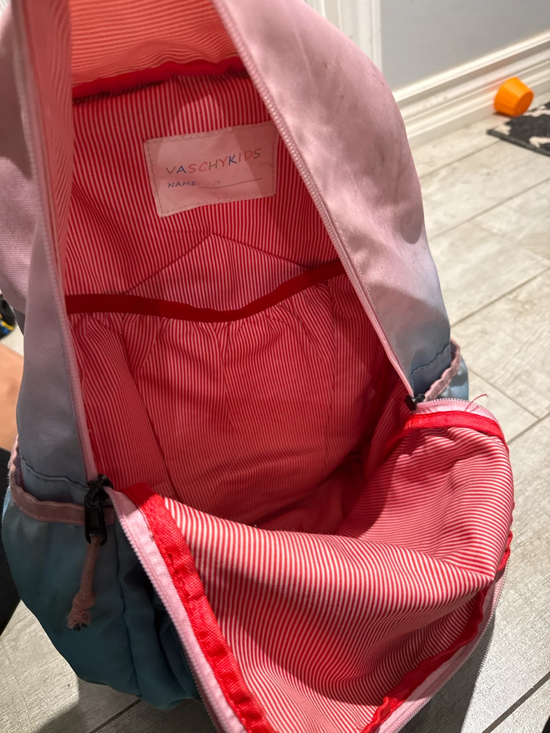 Pink and purple backpack with a gold crown. - photo 3