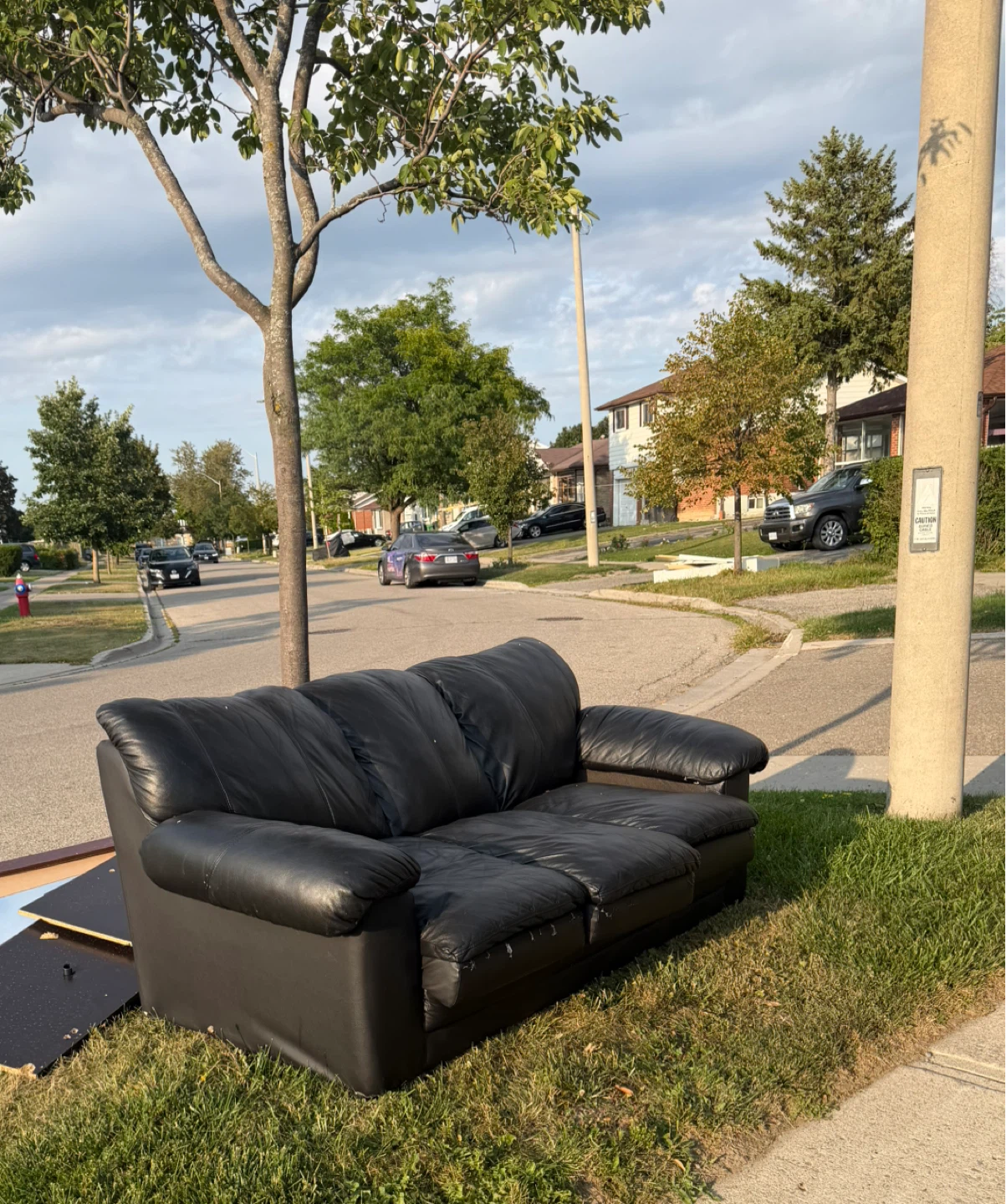 Black faux leather loveseat