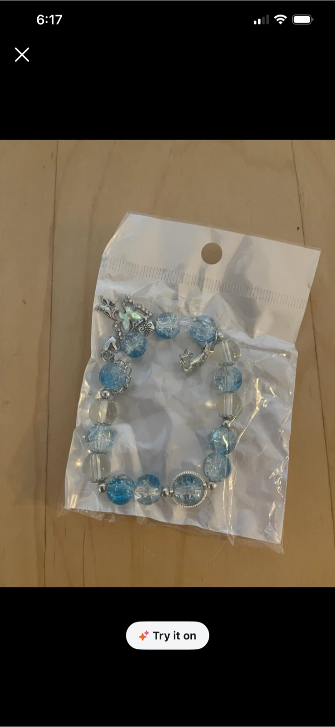Blue and clear beaded charm bracelet