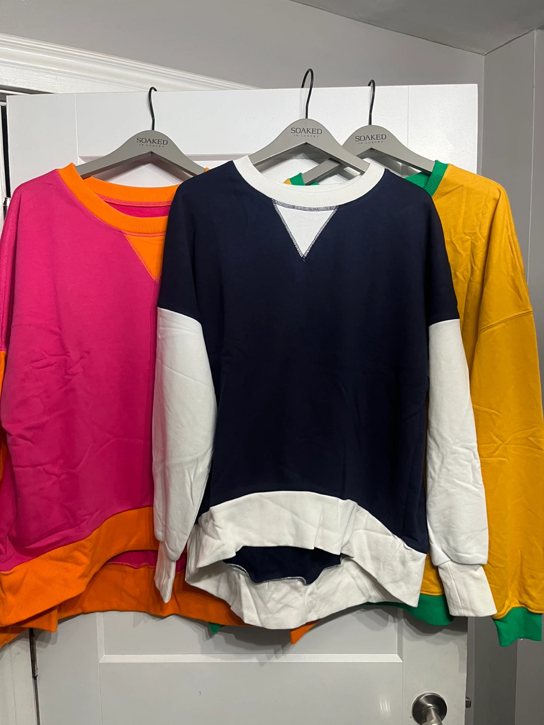 Women’s sweaters $5 each or track suit $10