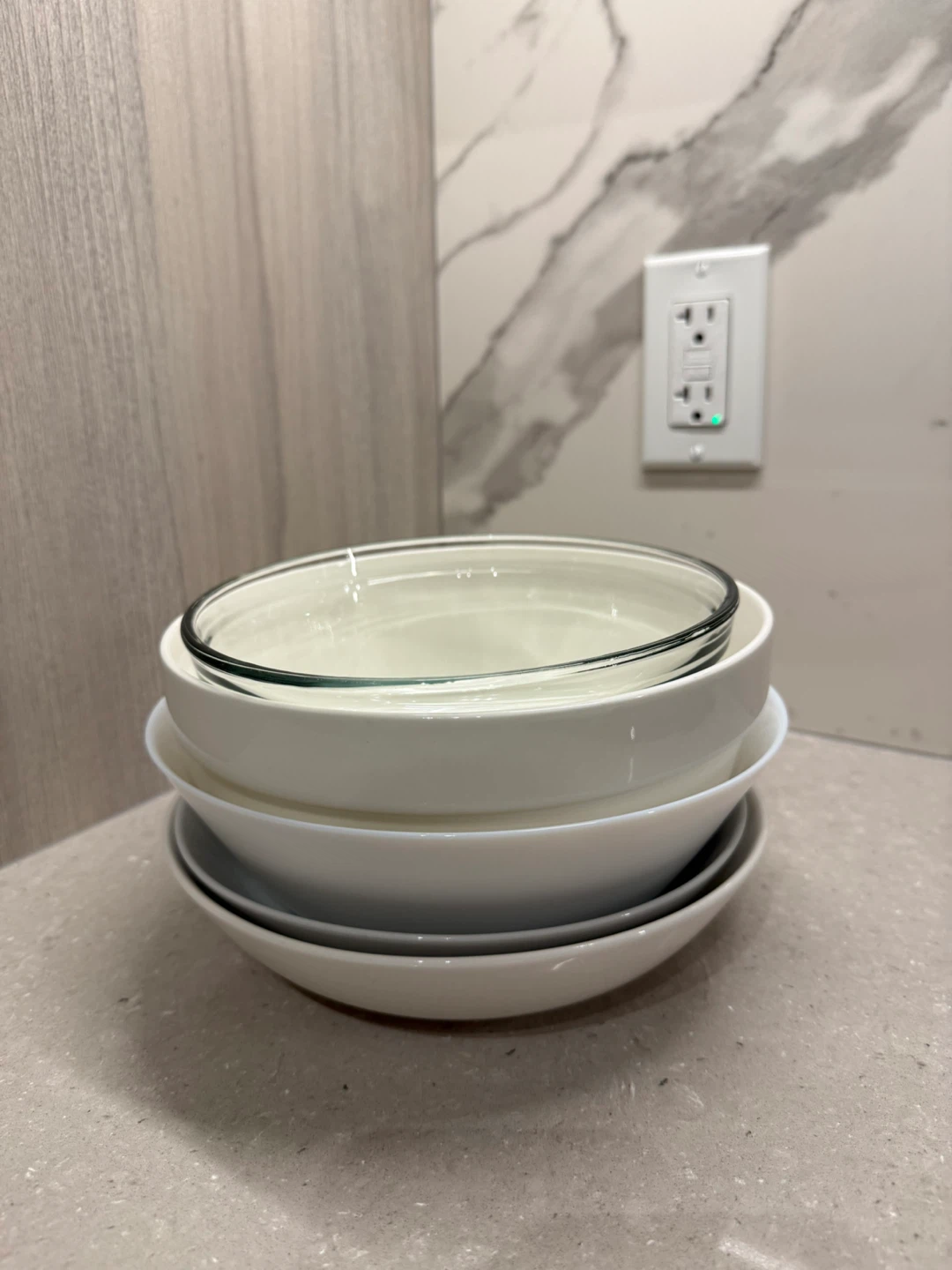 Assorted ceramic and glass serving bowls