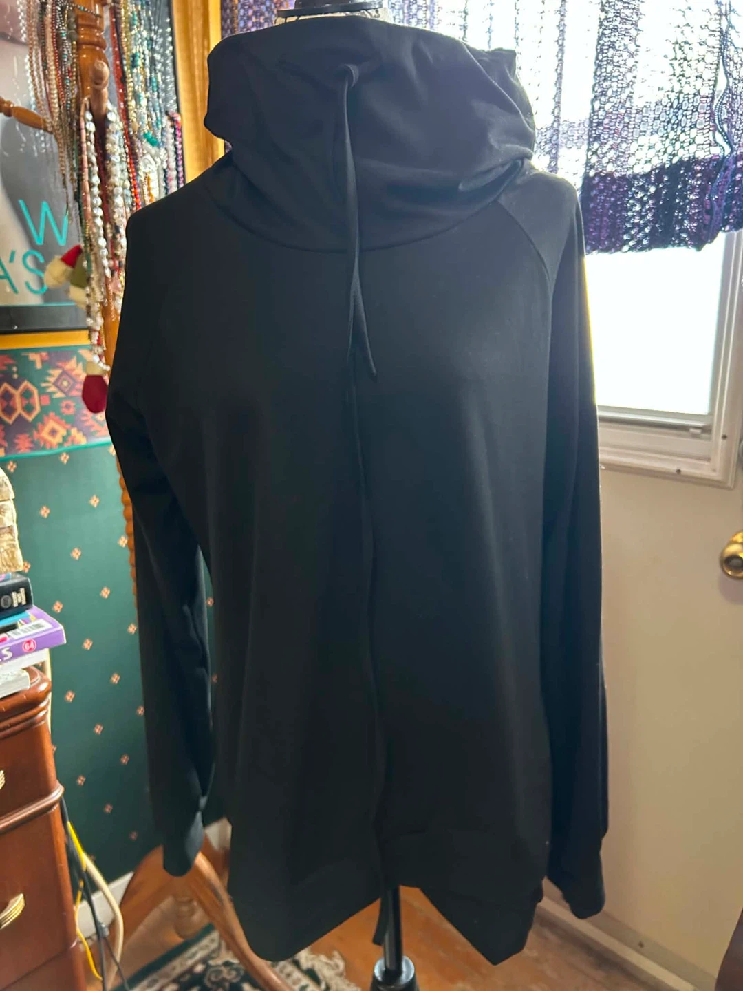 Black Cowl Neck Tunic with a Fancy Hemline