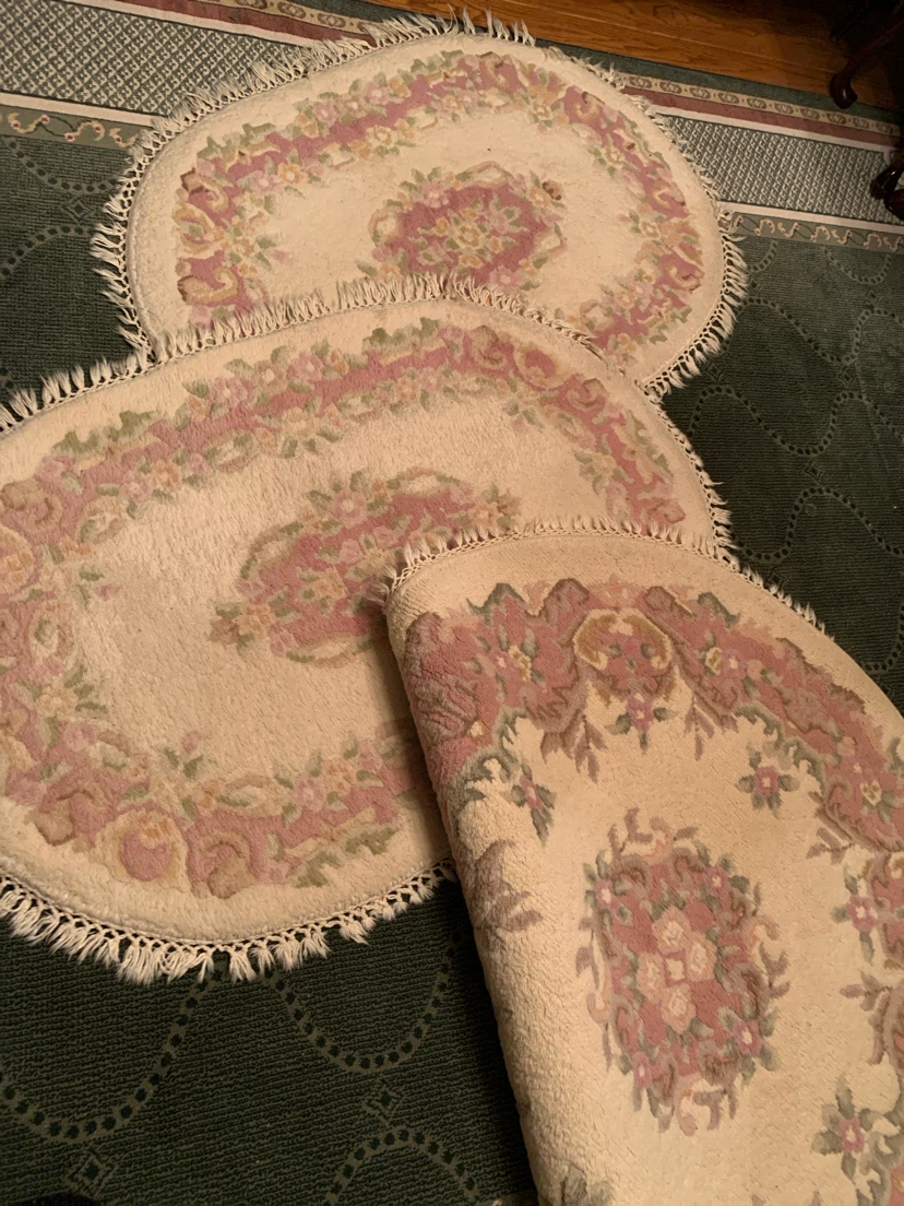Set of three floral wool area rugs