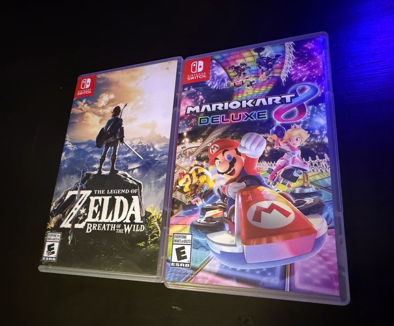 Zelda Breath of the Wild and Mario Kart 8 (cases only)