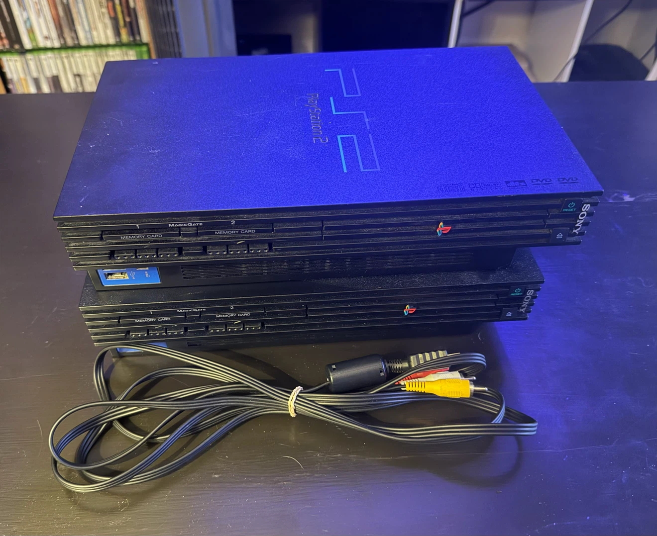 Sony PlayStation 2 consoles and AV cable