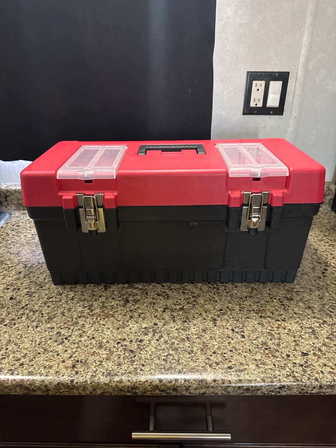 Red and black plastic toolbox