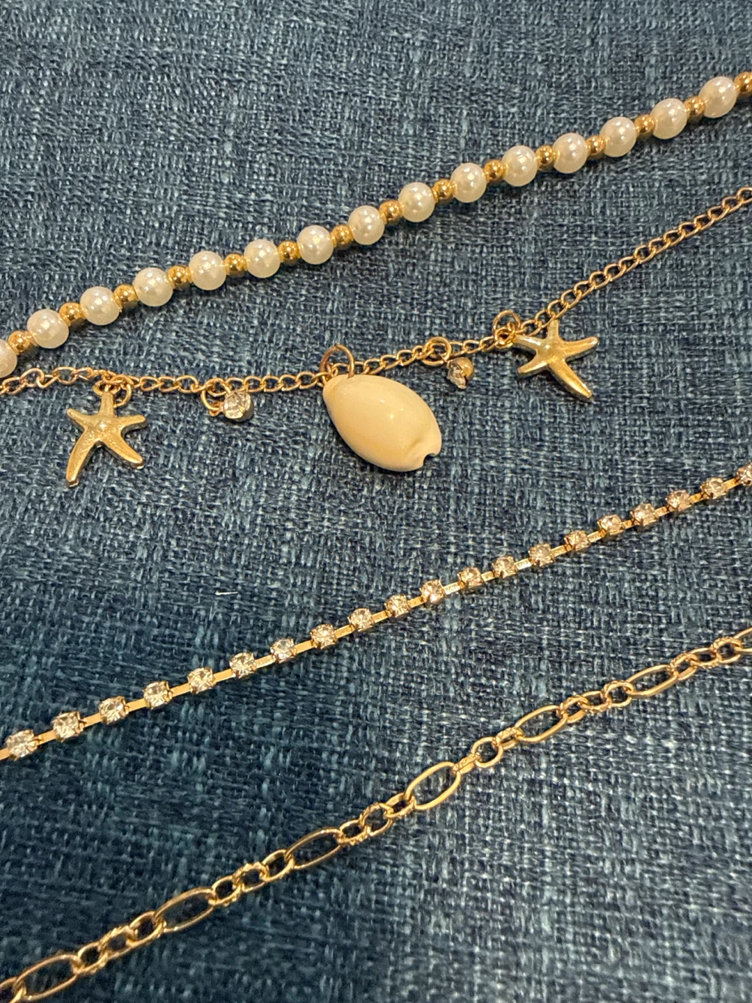 Gold-tone bracelet with Pearls, Shell, and Rhinestones