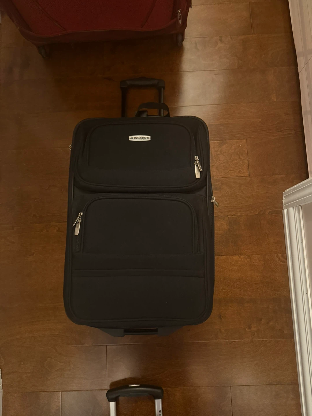 Stratus Black Rolling Suitcase